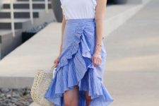 With ruffled wrap skirt, straw bag and white sandals