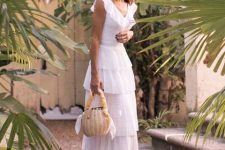 With straw bag and polka dot sandals