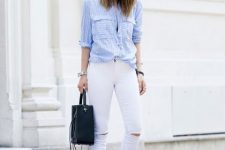 With white distressed pants, black bag and white flat sandals