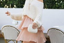 With white one shoulder sweater, white clutch and beige high heels