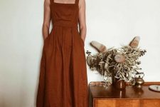 a comfortable rust-colored linen midi sundress with thick straps, a square neckline and pockets is a very cool idea