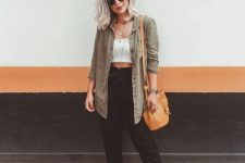 a comfy outfit with a white crop top, black linen pants, platform shoes, a grey chambray shirt and an orange bag for summer