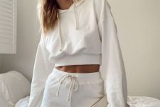 a creamy homewear set of a cropped hoodie and shorts can be worn outside for sport or going to grocery’s too