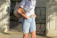 a relaxed summer look with a white tee, blue denim biker shorts, two tone flats and a straw bag