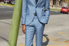 a cool summer work men outfit with a linen suit