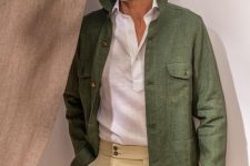 a white linen shirt, a green linen jacket and tan pants for a stylish and elegant summer look that is work-appropriate