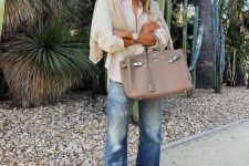 08 a striped shirt, blue jeans, a neutral jumper, tan flats and a tan bag for a cool summer to fall look