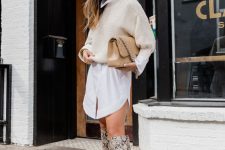 18 a white shirtdress, a creamy chunky cropped sweater, snakeskin print tall boots and a tan bag for the fall
