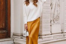 20 a refined fall outfit with an oversized white turtleneck sweater, a mellow yellow slip midi skirt, floral shoes and a white bag