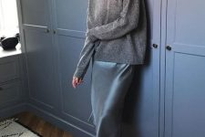 21 a beautiful fall look with an oversized grey sweater, a blue slip midi, deep red boots is gorgeous