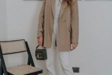 27 a grey top, white sweatpants, grey trainers, an oversized tan blazer and a grey mini bag to rock this fall