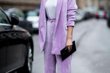 33 a gorgeous lilac corduroy oversized pantsuit with a white t-shirt, mint pumps and a black clutch is super cool