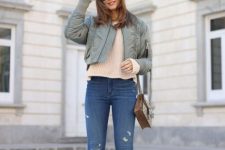 With beige crop sweater, gray jacket, bag and lace up shoes