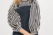 With black and white striped blouse and red bag