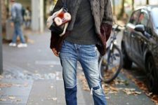 With gray sweater, faux fur jacket, silver boots and bag