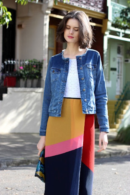 With polka dot shirt, printed clutch and color block maxi skirt