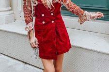 With printed blouse, white fringe bag and suede boots