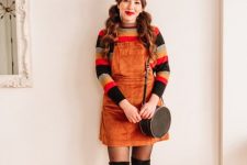 With red cap, striped sweater, over the knee boots and rounded bag