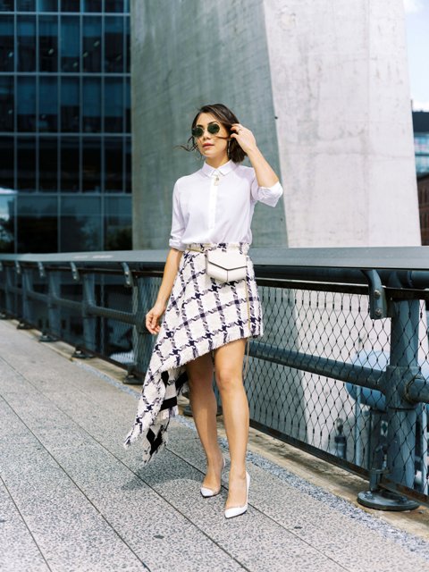 With white button down shirt, white waist bag and white pumps