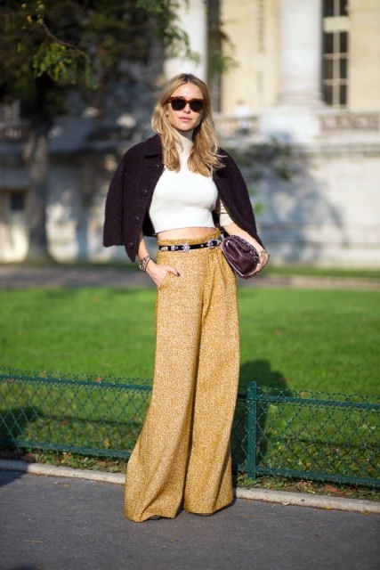 With white crop shirt, brown jacket and purple clutch