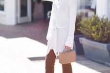 With white loose button down shirt, beige bag and beige pumps