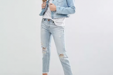 With white loose t-shirt, light blue distressed cropped jeans and black lace up high heels