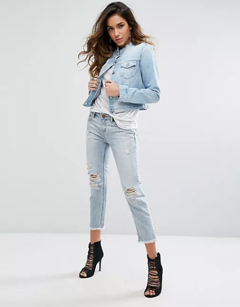 With white loose t-shirt, light blue distressed cropped jeans and black lace up high heels
