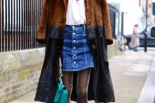 With white shirt, two colored faux fur coat, chain strap bag and leather boots