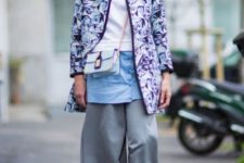 With white sweatshirt, light blue button down shirt, pastel colored chain strap bag, gray culottes and colorful sneakers