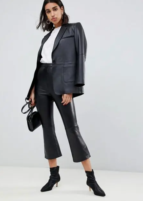 With white t-shirt, black mini bag, black leather blazer and black ankle boots