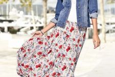 With white top, floral printed maxi skirt and red high heels