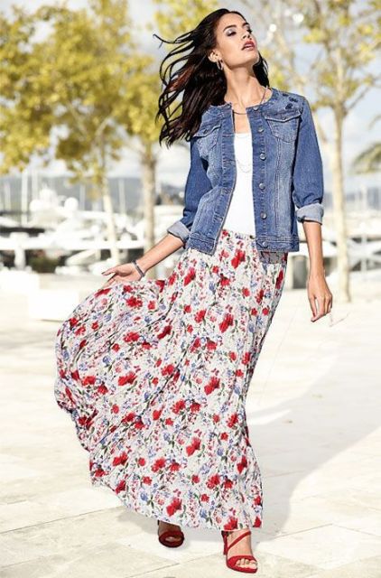 With white top, floral printed maxi skirt and red high heels