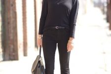 a black jumper, black cropped flare jeans, black ankle strap heels, a grey bag for going to work
