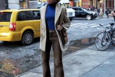 a bold fall outfit with an electric blue turtleneck, grey jeans, a dove grey corduroy blazer, snakeskin print booties and a brown bag