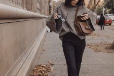a grey jumper with flare sleeves, black cropped jeans, rust-colored boots and a brrown crossbody bag for a cool and easy look