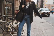 a pretty outfit with a striped t-shirt, a black cardigan, a black blazer, blue slim leg jeans, black boots and a bag