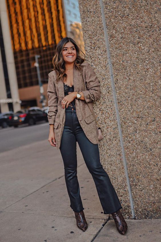 a sexy fall look with a black lace top, black flare jeans, brown snakeskin print boots and a brown blazer