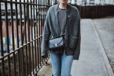 a striped long sleeve top, a grey cardigan, blue jeans, black lacquer Mary Jane shoes and a black bag