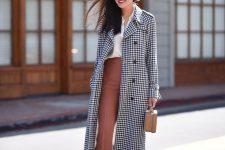 a white shirt, dusty pink cropped trousers, blush heels, a plaid midi coat and a tan mini bag for a chic look