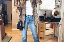 a white t-shirt, a plaid blazer, blue slim leg jeans, tan boots and a black bag are a great look