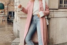 a white turtleneck, white trainers and a bag, a pink coat and light blue slim leg jeans for a cold day