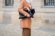 03 a work outfit with a white turtleneck sweater, brown trousers, white slingbacks, a rust knee coat and a black bag