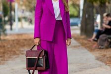 04 a bold purple pantsuit with an oversized blazer, culottes, a white top, black mules and a two tone bag for fall