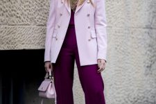 06 a chic fall work outfit with a purple top and trousers, a pale pink oversized blazer, black shoes and a pale pink bag