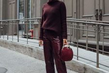 09 a deep purple sweater, burgundy vinyl pants, a fuchsia bag and black heels for a monochromatic fall look