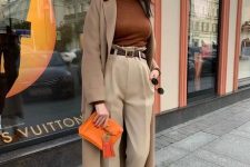 a stylish brown fall work outfit with an orange bag