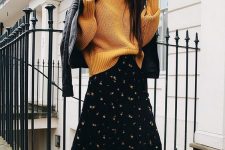 10 a pretty outfit with a black floral midi dress, a bold yellow sweater, black combat boots, a black leather moto jacket is amazing