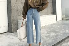 a pastel sweatshirt is perfect for a cozy fall look