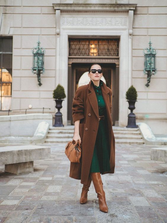 an emerald midi shirtdress paired with a brown midi coat, boots and a matching bag for an ultimate work look