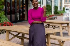 19 a pretty fall work outfit with a purple top, a lavender grey pleated midi, fuchsia shoes and statement earrings